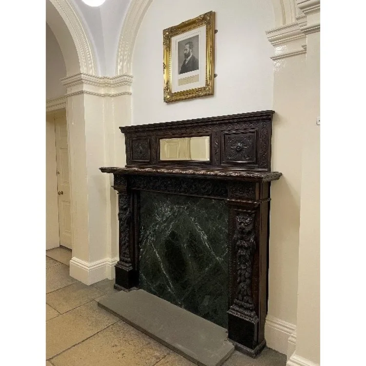 Fireplace in the hallway of Newnham Grange
